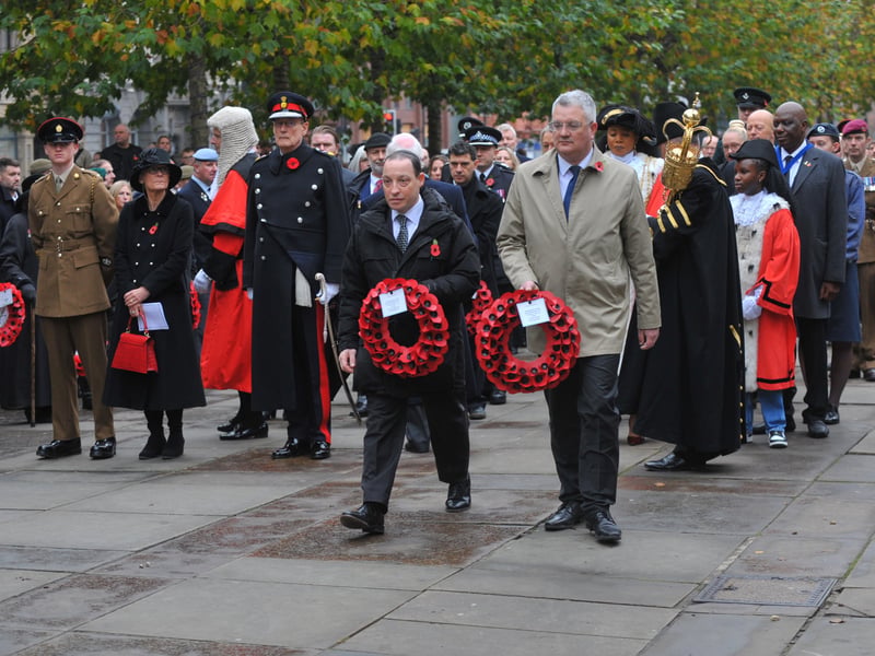 The leader of the Conservative group Coun Dan Cohen and the leader of the Labour group Coun James Lewis lay wreaths