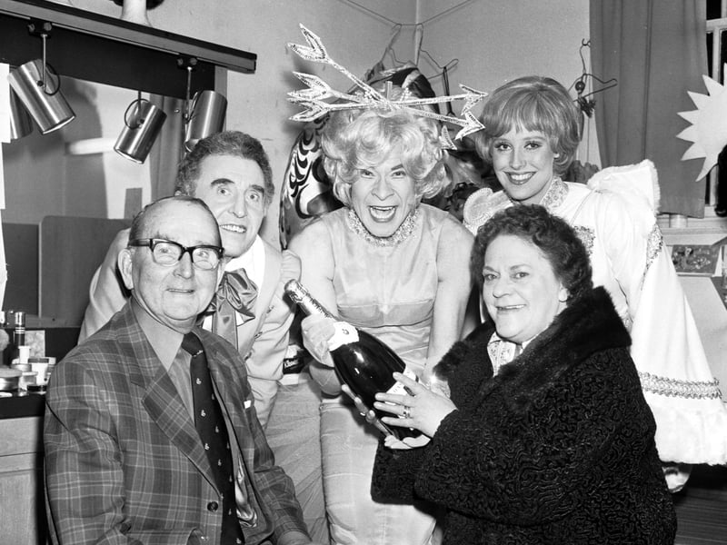 The 100,000th visitor to the Jack and the Beanstalk pantomime at the King's theatre Edinburgh wins a bottle of champagne and a trip backstage to meet stars Stanley Baxter and Patricia Michael in February 1976.