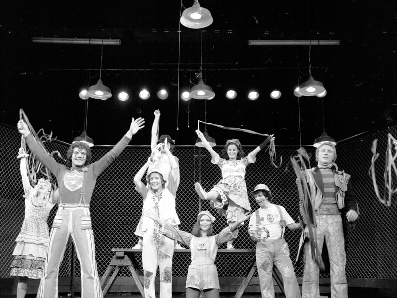 Cast members of the Edinburgh Festival Fringe production of Godspell at the King's theatre in September 1973,  including Jess Conrad (Superman shirt) and Lesley Joseph (standing on bench in bloomers, right).