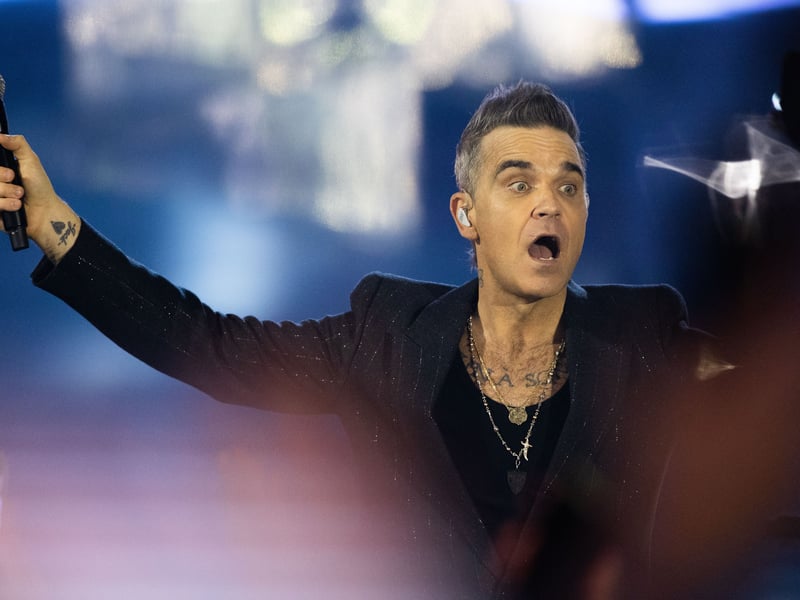 Robbie Williams brings his electrifying presence and legendary hits to Scotland as part of his highly anticipated Greatest Hits tour. Known for his larger-than-life personality and unforgettable performances, Williams promises to deliver an unforgettable afternoon at Edinburgh's Scottish Gas Murrayfield on May 31 2025.