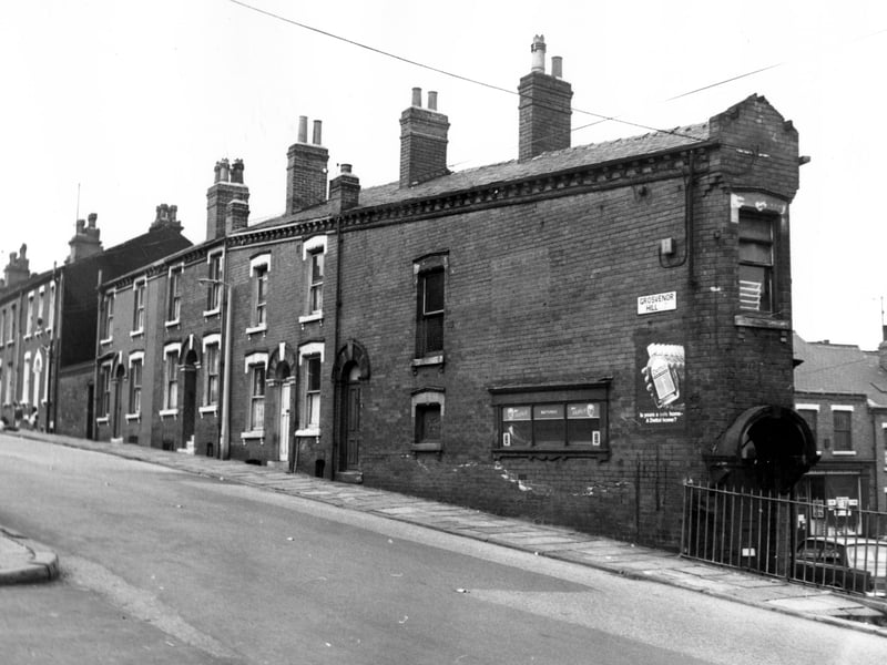 Grosvenor Hill, from the junction with Oatland Lane/Servia Road. The property on the right is a handyman's store. Across Servia Road on the right can be seen a branch of the Leeds Co-op which was on Servia Grove.