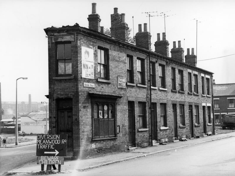 The junction of Woodhouse Street on the left and Oxford Road. Forbes Enginering works is on Woodhouse Street, Peter Laycocks Mill can be seen on the skyline. The shop at the junction is 45 Woodhouse Street. On Oxford Road the numbers descend from 64 to 56. There is a cleared site, then Oakfield Street is on the right edge. A sign indicates a traffic diversion to Meanwood Road.