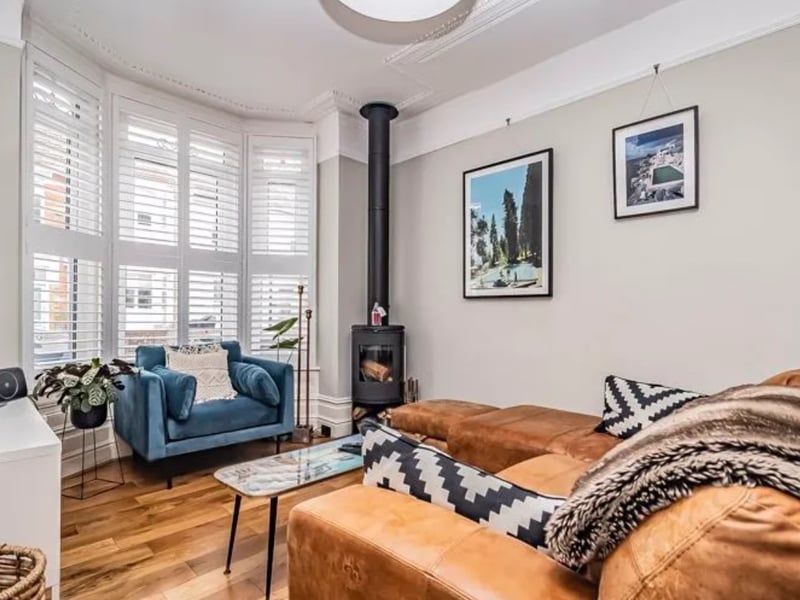 The listing says: "Situated on the popular Liss Road in Southsea, this beautifully presented property provide a light and spacious living room, complete with a large bay window and feature log burner." 
