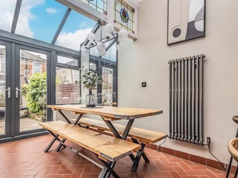 This home comes with four bedrooms, two bathrooms and two reception rooms.