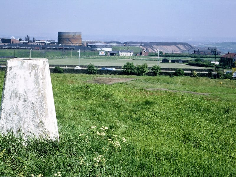 A view of a trigonometrical pillar at Tingley Hall used for O.S. surveying. The distant view is of Leeds. This is the area where the motorway roundabout at Tingley Crossroads would be constructed. Pictured in May 1966.