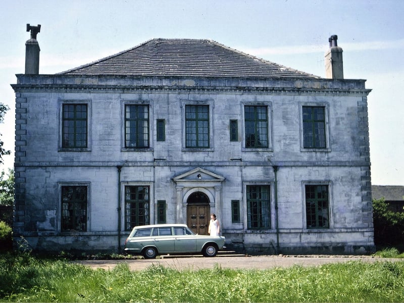 Tingley Hall pictured in May 1966 shortly before demolition for road widening in 1967. It was built in the early 18th century with it's own lodge and extensive grounds. The proprietors of Topcliffe pit were the owners of Tingley hall for many years. It was eventually converted to flats.