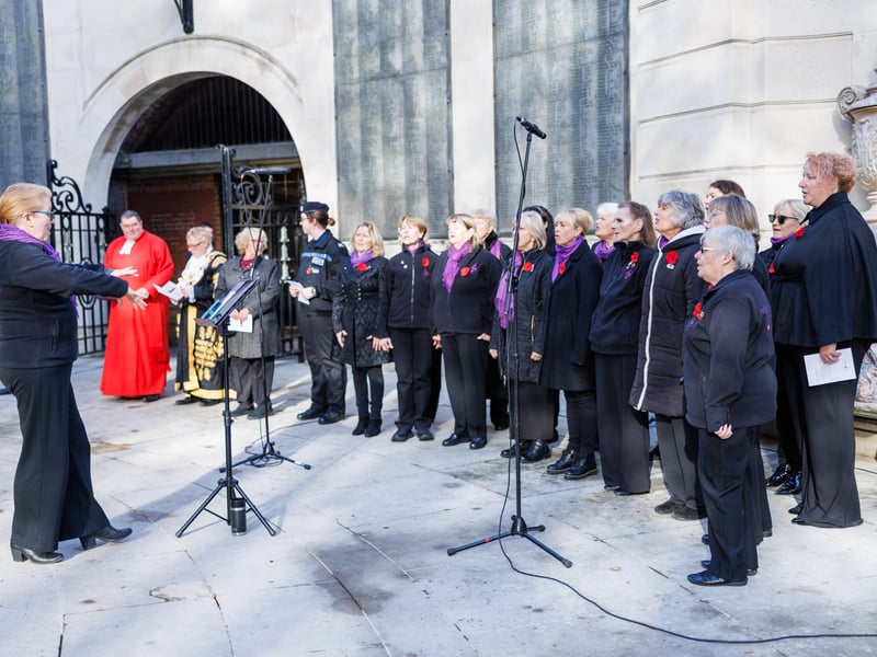 A choir performs at the service
