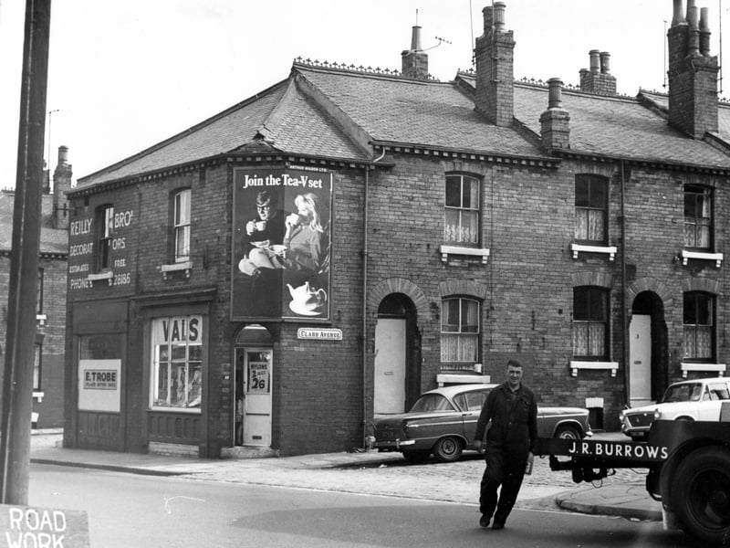 Claro Avenue from the junction with Cambridge Road (foreground). The two businesses seen in Cambridge Road number 17, left, and 19, right. A sign in the ground floor window of number 17 reads 'E Trobe, Licensed Betting Office'.  Number 19 is a shop called 'Vals' selling ladies-wear.