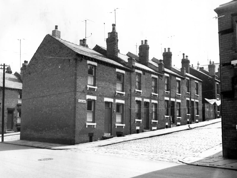 Claro Avenue seen from Servia Road. This is looking in the direction of Servia Hill. To the left is Servia Mount. Four small children are playing on the pavement.