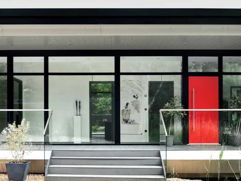 The listing says: "This superb five-bedroom, eco lake house bridges 4,000 sq ft of lateral space between two islands. The only one of its kind in the UK, the house was built to the designs of Peter Huf and completed in 2021." 