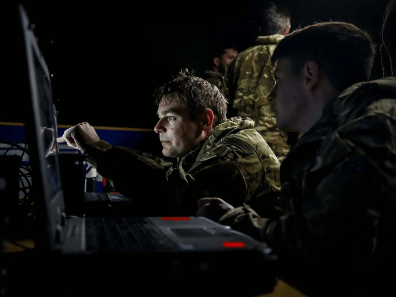 Students planning training serials during Exercise Merlin Storm.