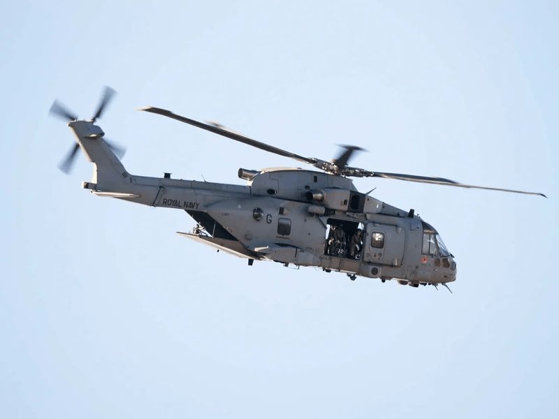 A Merlin Mk4 helicopter conducting a mountain flying sortie.