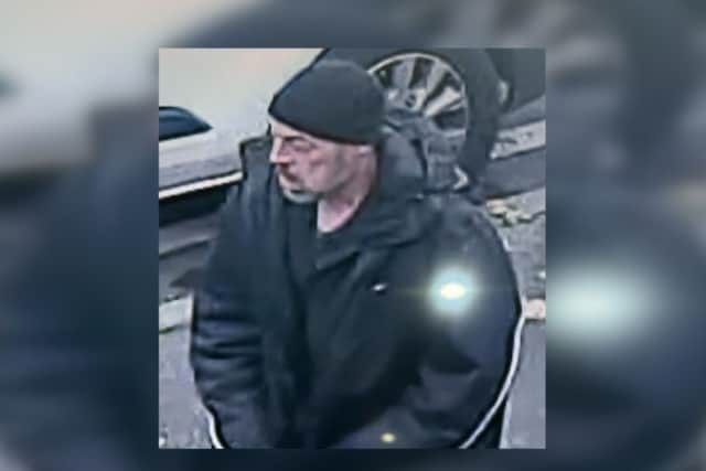 Police have released this CCTV image of a man they would like to identify in connection with an alleged robbery, which left a 77-year-old woman with 'serious injuries'.
He is described as 'a white man, of a medium build, and aged between 40 and 50 years old, with stubble as facial hair'