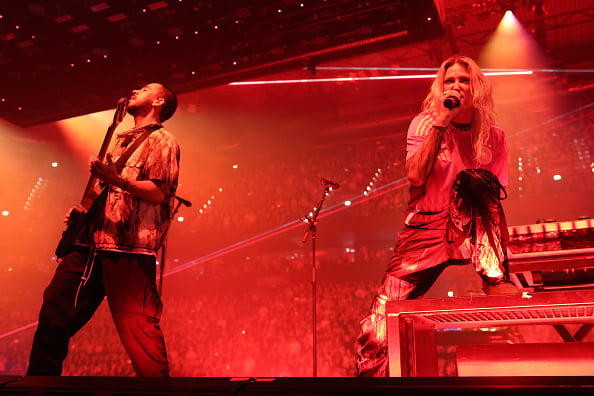 Fans were excited over the cryptic messages Linkin Park shared over social media and online; the result was an intimate performance where they revealed their new lead singer - Emily Armstrong - would take over the role from the late Chester Bennington. However, her Scientology roots also led to a lot of online discourse - and searching on Google.
