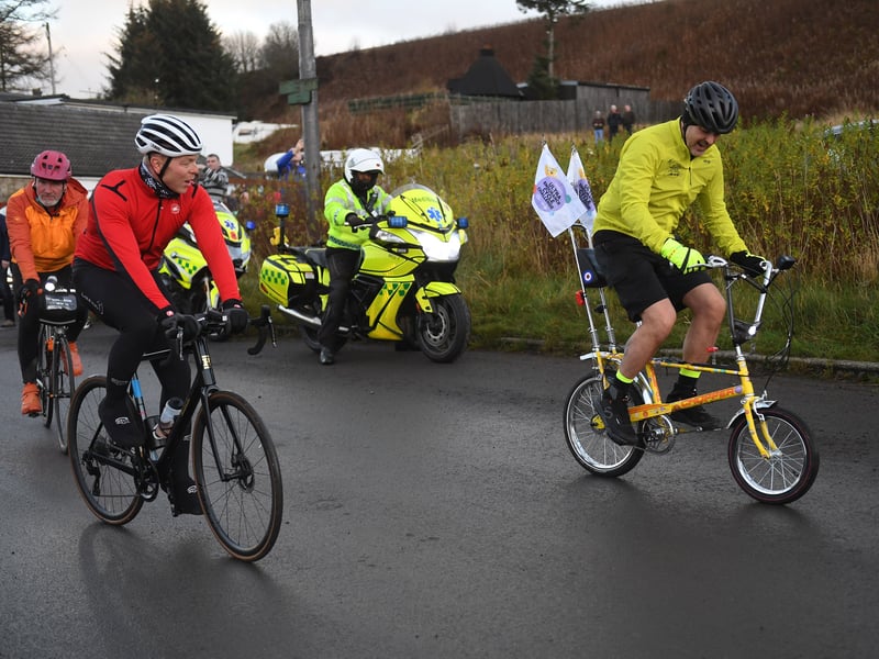 Sir Chris Hoy and Paddy McGuinness cycle together during the challenge at Crawford, near Abington.