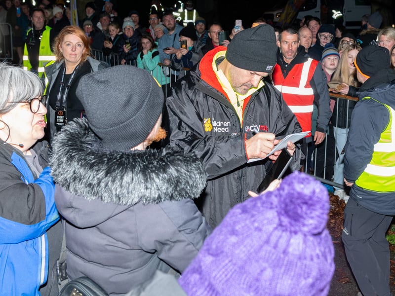 Paddy McGuinness greets the crowds in Preston's Moor Park after completing the first leg of his Ultra Endurance Cycle Challenge