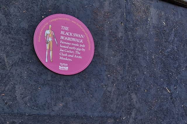 The plaque on the site of the former Boardwalk and Black Swan recalls its history. Photo: David Kessen, National World