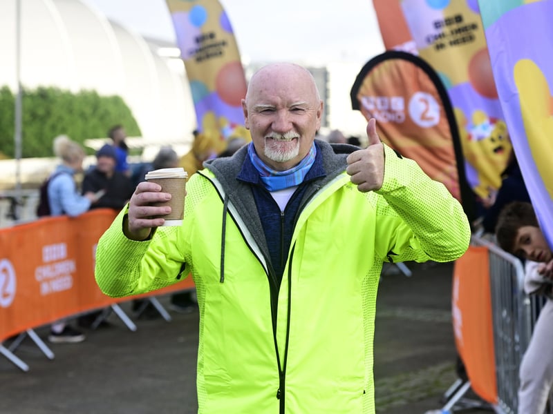 Sir Tom Hunter at the finishing line in Glasgow.