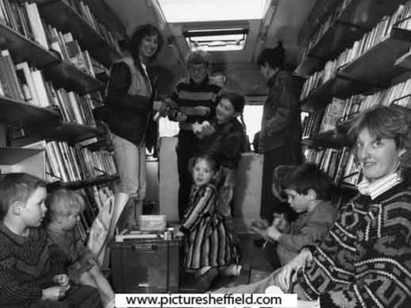 IIf you couldn't go the library, the library could come to you. Youngsters takig part in an activity on Sheffield's Mobile, during the 80s. Pictured standing 1st left, Diane Kostka. 2nd Left, Ann Staniland. Sitting to right is Judith Barratt. All Sheffield Library staff. Photo: Sheffield Council, Picture Sheffield