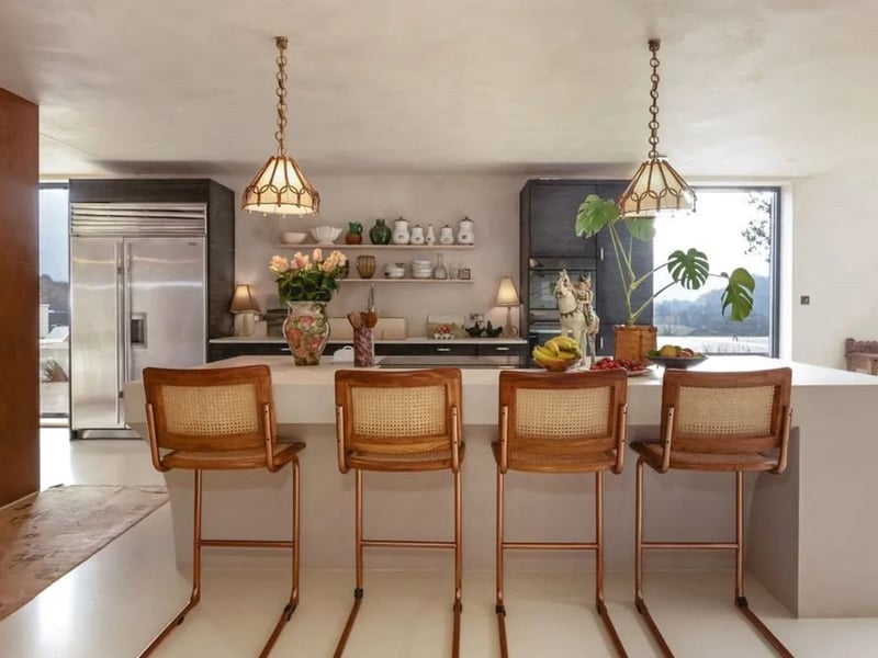 The kitchen is absolutely spectacular with its warm yet contemporary decor and vibe. 