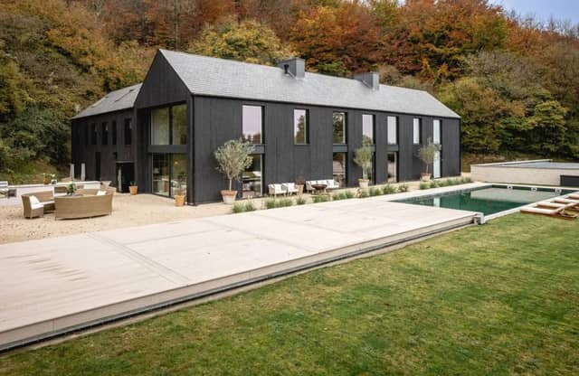 The exterior of this incredible home is absolutely stunning - but wait until you see the inside.