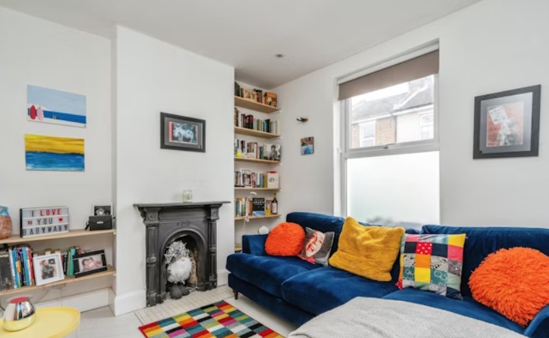This home comes with two bedrooms, a bathroom, a dining room and a spacious living room.