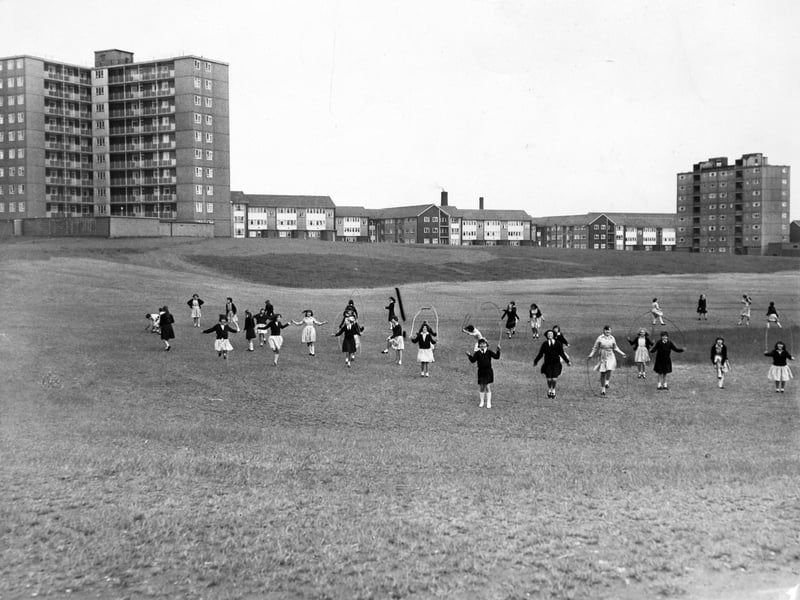 Pupils of St. Brigid's Roman Catholic School at play in a near-rural setting off Torre Road in May 1965.