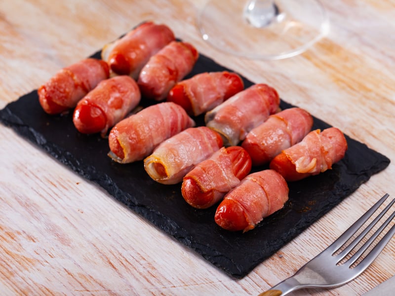 Pigs In Blankets are one of the most popular side dishes to enjoy as part of the Christmas dinner. The small sausages wrapped in bacon are always a huge hit, and while some choose to make the side themselves, the pre-made versions are always selling out. 