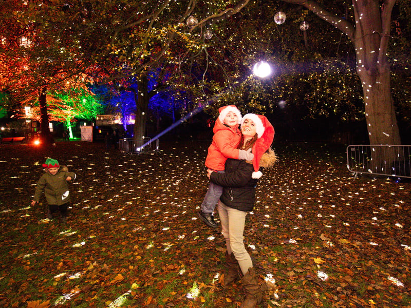 Mum Amanda with her son Austin enjoyed time between the illuminations at Victoria Park. Picture: Marcin Jedrysiak