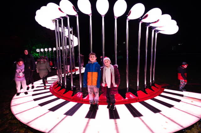Joshua and Rose had fun on the walking piano at Victoria Park. Picture: Marcin Jedrysiak
