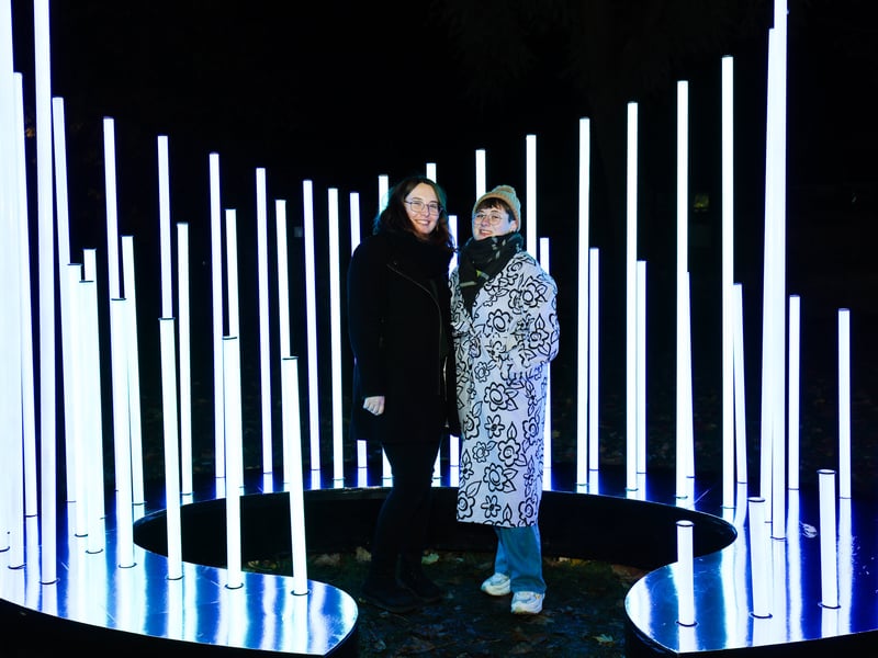Sarah and Elisha posing in illuminated scenery at St Mary's Church. Picture: Marcin Jedrysiak