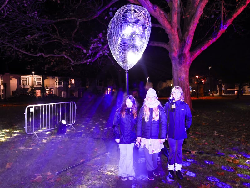 Poppy, Lola and Amelia admired the magical scenery near St Mary's Church. Picture: Marcin Jedrysiak