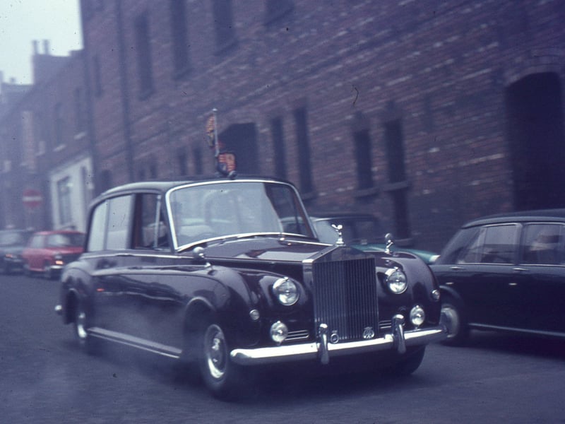 The Royal car travelling south on Portland Crescent. Queen Elizabeth II and the Duke of Edinburgh are not in the car but were visiting Leeds to open Seacroft Civic Centre.