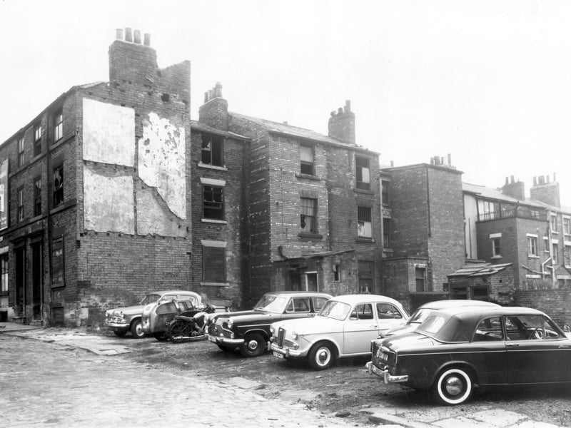 North Place is in view, looking at cleared site and back of North Street. Property is derelict and was to be included in the Benson Street clearance area. Part of North Place has already been demolished and is used as a car park. Pictured in October 1962.