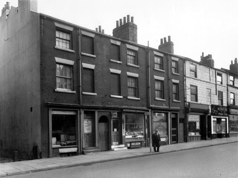 North Street in October 1962. To the left is North Terrace, next, moving right is 178 North Street, furniture upholstery business of I. Newman. At 174/6, Bloomfields shop and bakehouse, then 172, shop selling pillows. M. Shapero, opticians is at number 170, the edge of Freemans furniture shop can just be seen on the right edge.