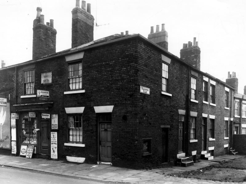 Newsagents shop and house on Sackville Street pictured in October 1960. There are a number of advertisements and posters around the shop. Your Yorkshire Evening Post has a headline 'Leeds Utd Transfer Shocks', the Beano comic has a free gift 'clicketty clacker' a needlecase with each issue. To the right is Wilmington Place.