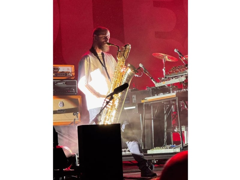 Adam Devonshire on saxophone.