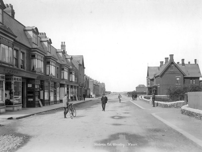 Victoria Road, Cleveleys, Lancashire, 1890-1910. A street view of Cleveleys looking west with shops and a bank to the left of the photograph and people on the road