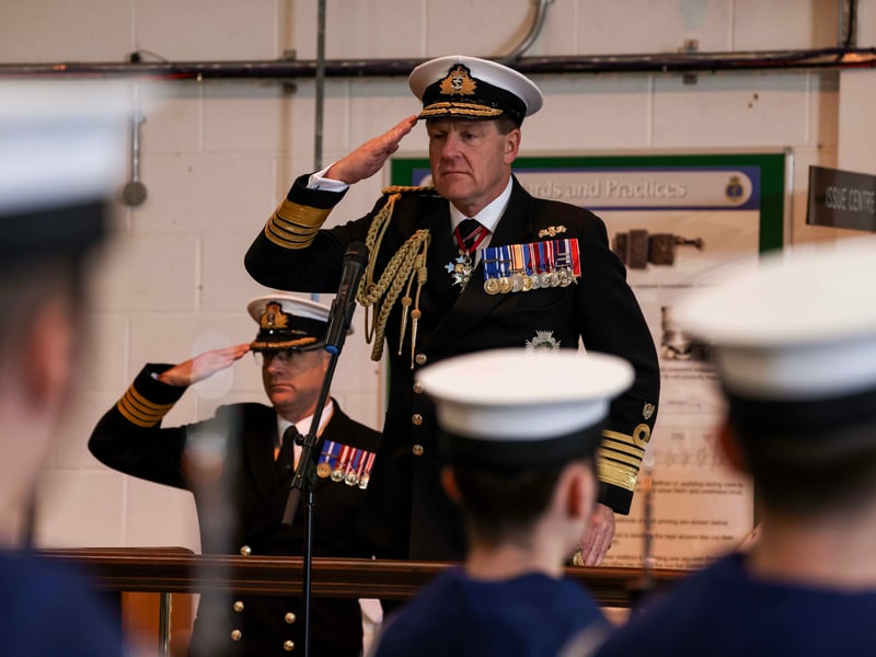 First Sea Lord, Admiral Sir Ben Key receives the salute at HMS Sultans Ceremonial Divisions.