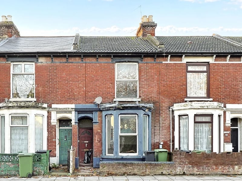 This three bedroom terraced home is up for auction with a guide price of £100,000. 