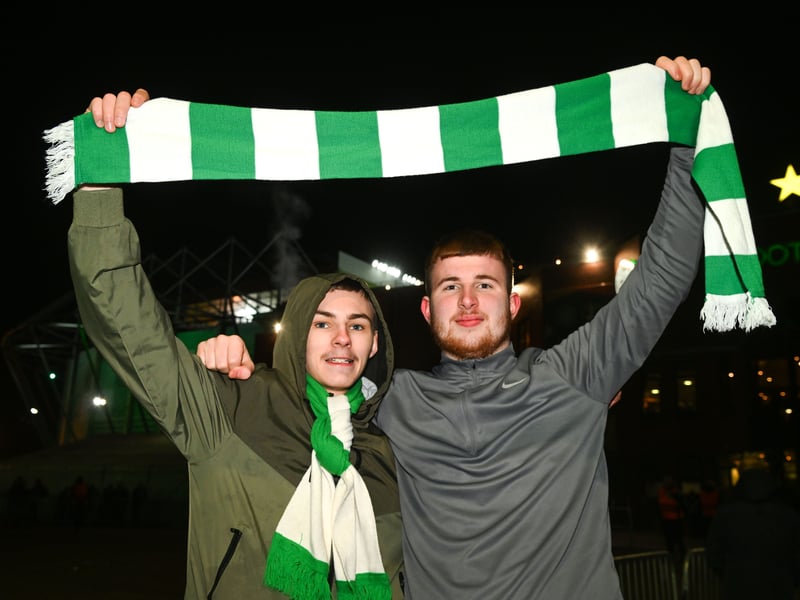 Two Celtic fans soak up the atmosphere ahead of the match with Club Brugge.