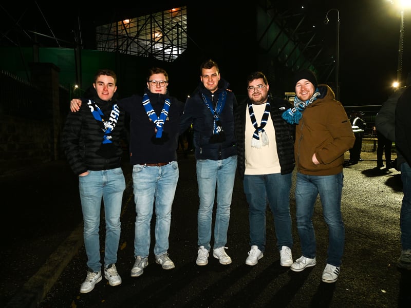These visiting Club Brugge fans make sure they're wrapped up for the game at a freezing cold Celtic Park.