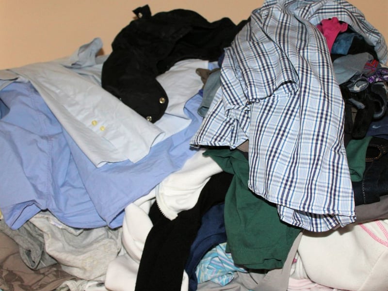 It's tricky to pick clothes for people - it's very much a matter of personal taste. Unless you are sure it's something they really want, don't bother - it'll be in a charity shop by New Year.
