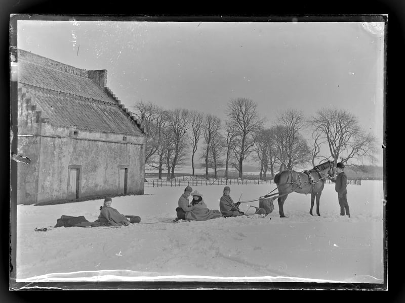 A cold day can be a fun day as shown by these youngsters at Montrave House near Leven, Fife in winter 1900. PIC: Lady Henrietta Gilmour Collection.