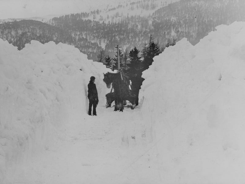 It was a no through road to Braemar in the winter of 1895 as snow drifts shut down the village. Photographed by Peter M Stewart. PIC: National Museums Scotland.