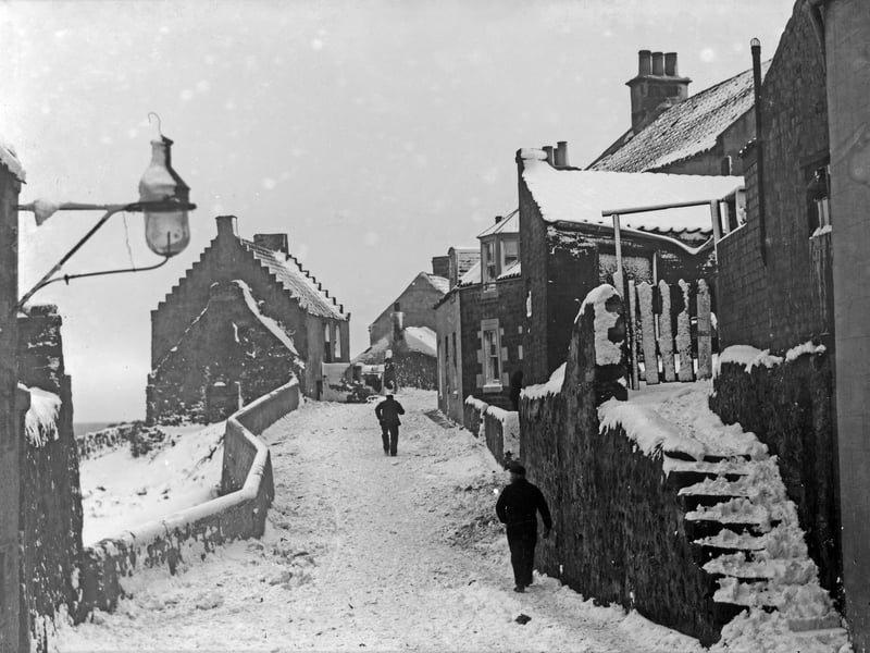 Winter at St Monans in Fife in the early 1900s, captured by William Easton. The photographer's family ran the fishing burgh’s pharmacy and general store and his photos were turned into early postcards of the village.