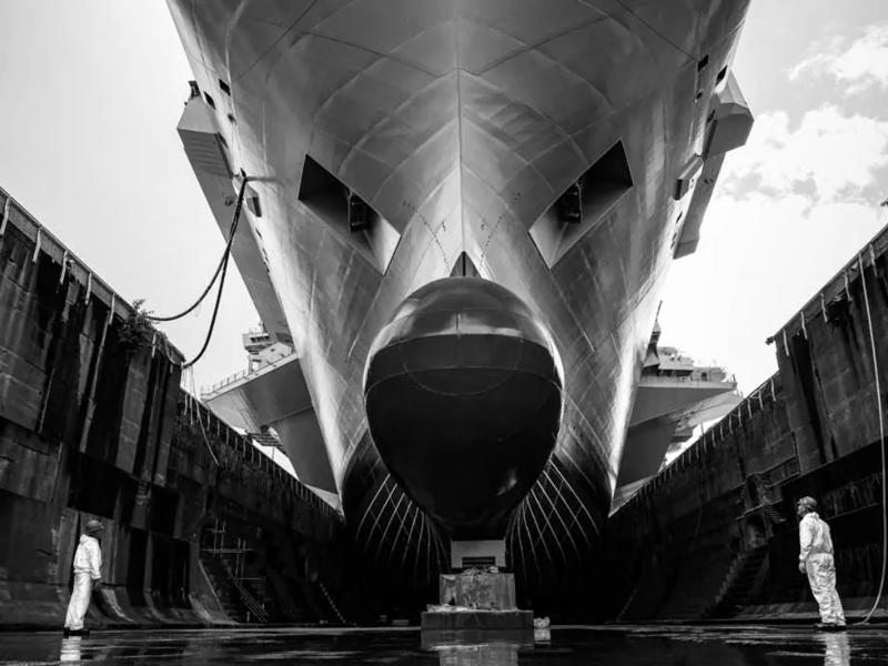 A monochrome picture of HMS Prince of Wales in drydock on June 12, 2023.