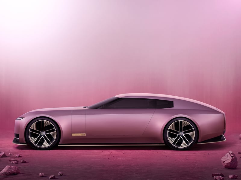 An exterior shot of the Jaguar Type 00 in Miami pink