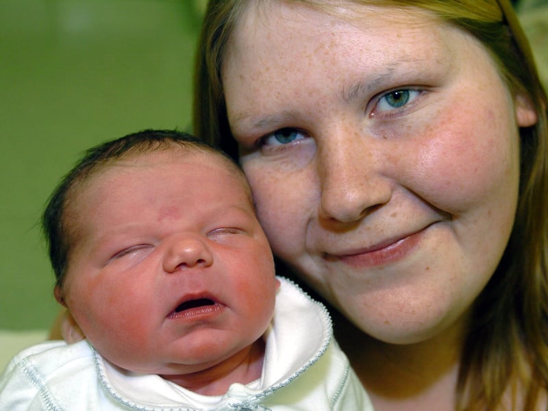 Mum Kelly Stoddart with baby Holly, who was born at one minute past midnight on Christmas Day in 2006.
