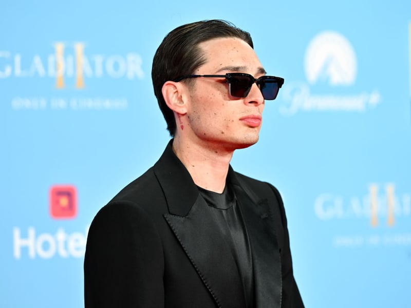 Perhaps a name less well known in the UK, Mexican rapper and singer Peso Pluma has become massive on TikTok - one of the main drivers of streaming in recent years. The social media platform has helped him break into the 2024 top 10 at number seven.